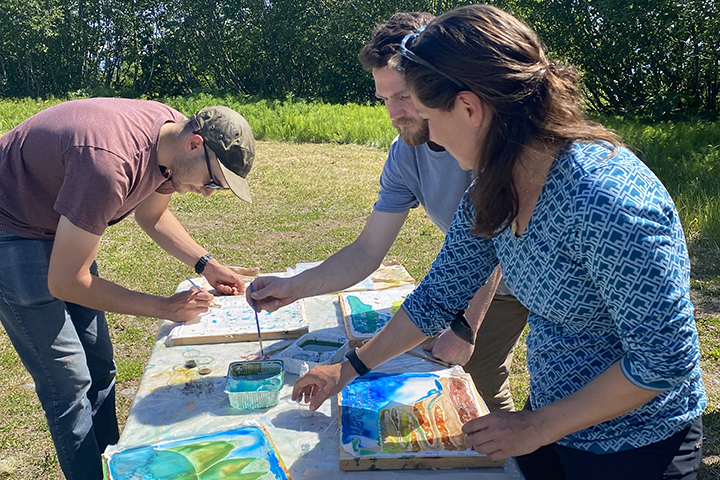 Participants engaging in an art-based method to explore the cultural ecosystem services of Kachemak Bay Reserve